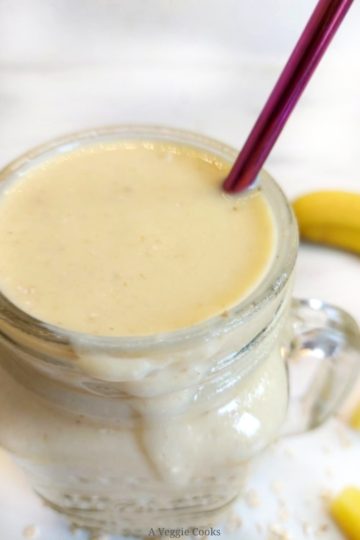 Glass containing mango and Pineapple Smoothie