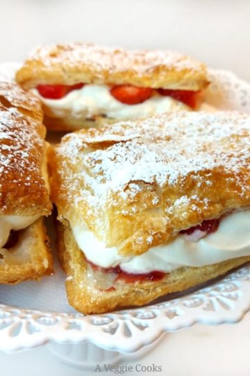 Puff pastry filled with vegan cream, strawberries and strawberry jam