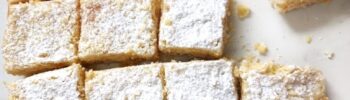 Vegan Apricot crumble bars traybake on a white surface