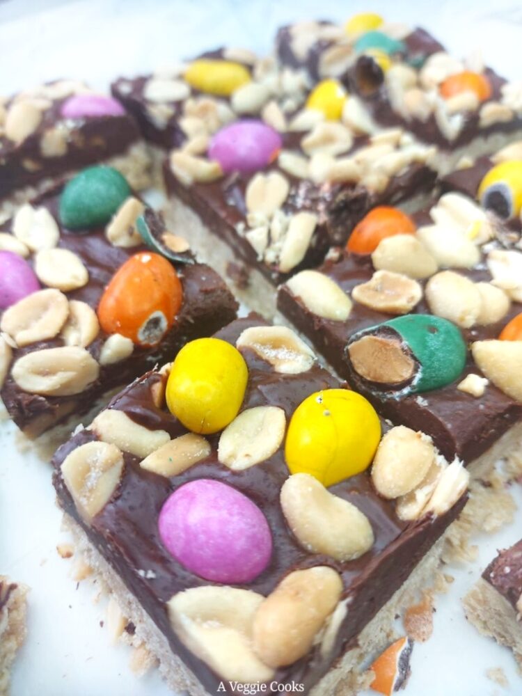 Vegan chocolate bars topped with salted peanuts and candied peanuts