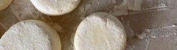 Dough on a floured surface cut into rounds