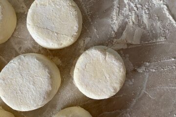 Dough on a floured surface cut into rounds