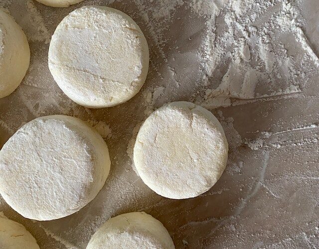 Dough on a floured surface cut into rounds