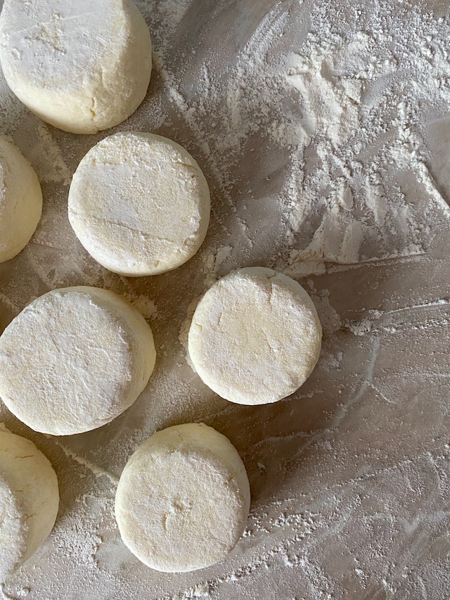 Dough on a floured surface cut into rounds