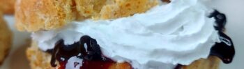 Vegan scone with jam and cream