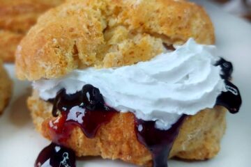 Vegan scone with jam and cream