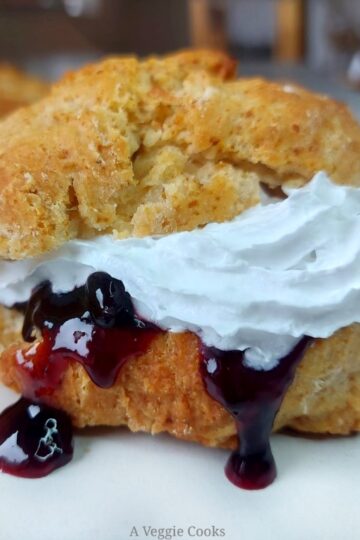 Vegan scone with jam and cream