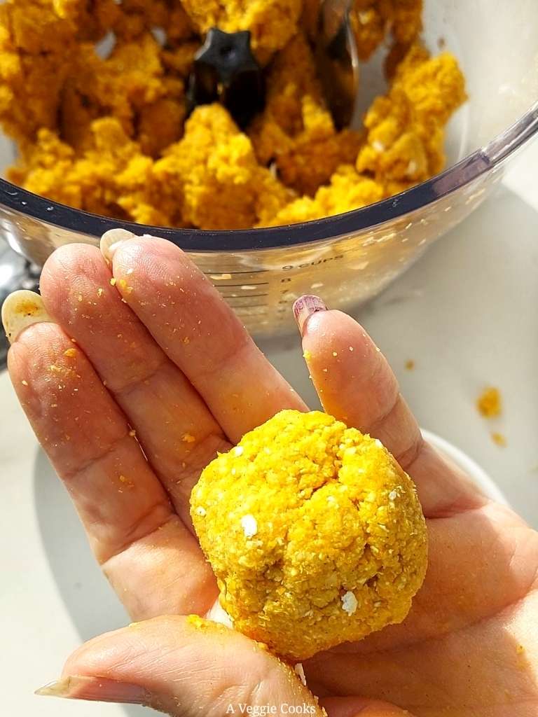 Apricot energy ball in a hand